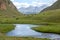 Farm animal feeding at river, Kyrgyzstan