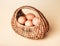 Farm brown-shelled eggs in basket. Easter celebration concept. Eco-friendly organic products