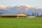 Farm Building and Winter Mountain Landscape