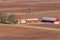 Farm in the countryside with newly sown fields