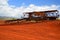 Farm equipment appears abandoned at a pineapple plantation