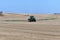 Farm field being sprayed in the spring