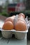 Farm Fresh Chicken Eggs with Red Barn in Background