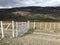 Farm gates in Patagonia prairies.