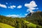 Farm on a grassy mountainside