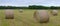 Farm hay bales country field meadow landscape agriculture panorama rural pasture