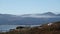 Farm house and misty mountain from Storlauvoya on the Atlantic road in More og Romsdal in Norway