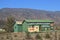 Farm houses besides the country road on Route 62, in the Karoo, South Africa.