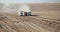 Farm machinery harvesting Idaho potatoes.