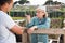 Farm neighbors talk at the border