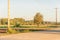 Farm road and snowcapped Mountain Rainier at background in Kent, Washington at sunset