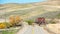 Farm with rusted barn and Autumn trees