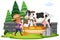 Farm scene with boy feeding hay to the cows