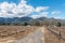 Farm scene, with vineyards and buildings, at Paarl