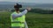 Farm specialist engineer using technology VR monitoring harvest working for agriculture productivity at large wheat