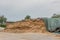 a farm there is a huge mountain of fodder silage