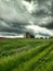 Farm and threatening stormy sky