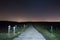 Farm Track under Starry Sky with East Dean Village