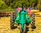 Farm Tractor With American Flags At Small County Fair