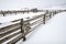 Farm wood corral in winter snow