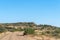 Farm worker houses next to road D2679