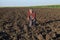 Farmer analyze arable land