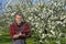 Farmer analyzes flower cherry