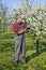 Farmer analyzes flower cherry