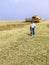 Farmer analyzing worl of combine harvester