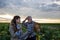 Farmer and business woman in field