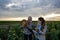 Farmer and business woman in field