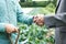 Farmer And Businessman Shaking Hands