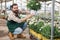 Farmer caring osteospermum ecklonis