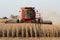 Farmer in a Case Combine Harvester