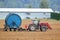 Farmer Checks His Irrigation Hose