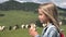 Farmer Child Eating Sandwich while Pasturing Sheep in Mountains, Shepherd Kid Taking Snack, Hungry Girl at Picnic in Camping