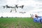 Farmer control agriculture drone fly to sprayed on corn field