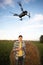 Farmer controls drone. Smart farming and precision agriculture