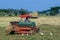 Farmer driving tractor in the fields.