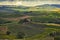 Farmer estate with vineyards at sunrise in San Quirico d\'Orcia
