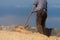 The farmer fanning wheat separating the wheat