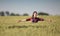 Farmer girl in barley field