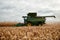 Farmer harvesting maize in autumn