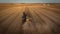 Farmer harvesting soybeans in Midwest