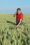 Farmer inspect wheat field