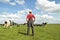 Farmer looking at his cows