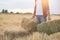 Farmer man with straw bales