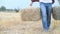 Farmer man with straw bales