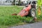 Farmer mowing with mower grass