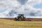 Farmer ploughing an overwintered field ready for planting